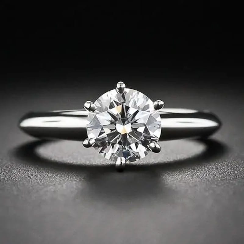 A classic solitaire diamond ring with knife edge and 6 claw setting.