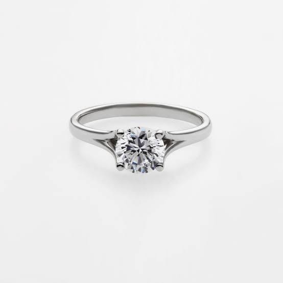 Swept and split shoulder solitaire diamond ring.